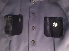 99 PiL badge on Rei Kawakubo Comme des Garçons jacket